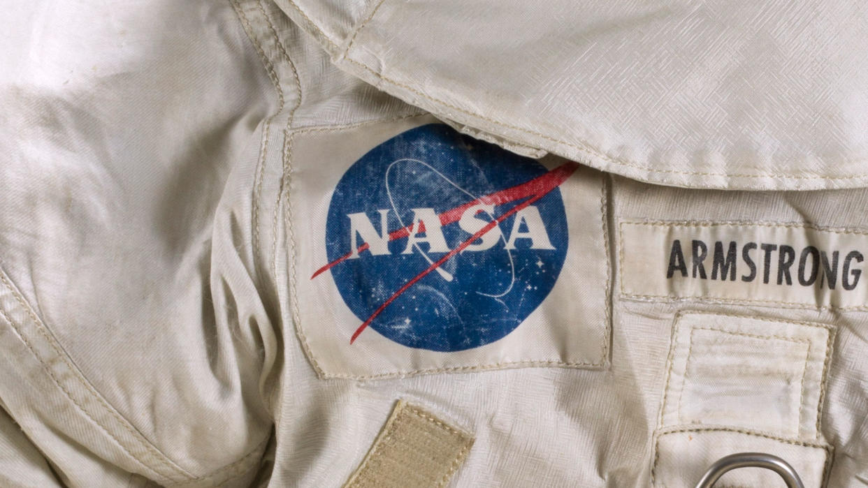  NASA's official insignia, nicknamed the "meatball," as worn on the moon by Apollo 11 astronaut Neil Armstrong in 1969. . 