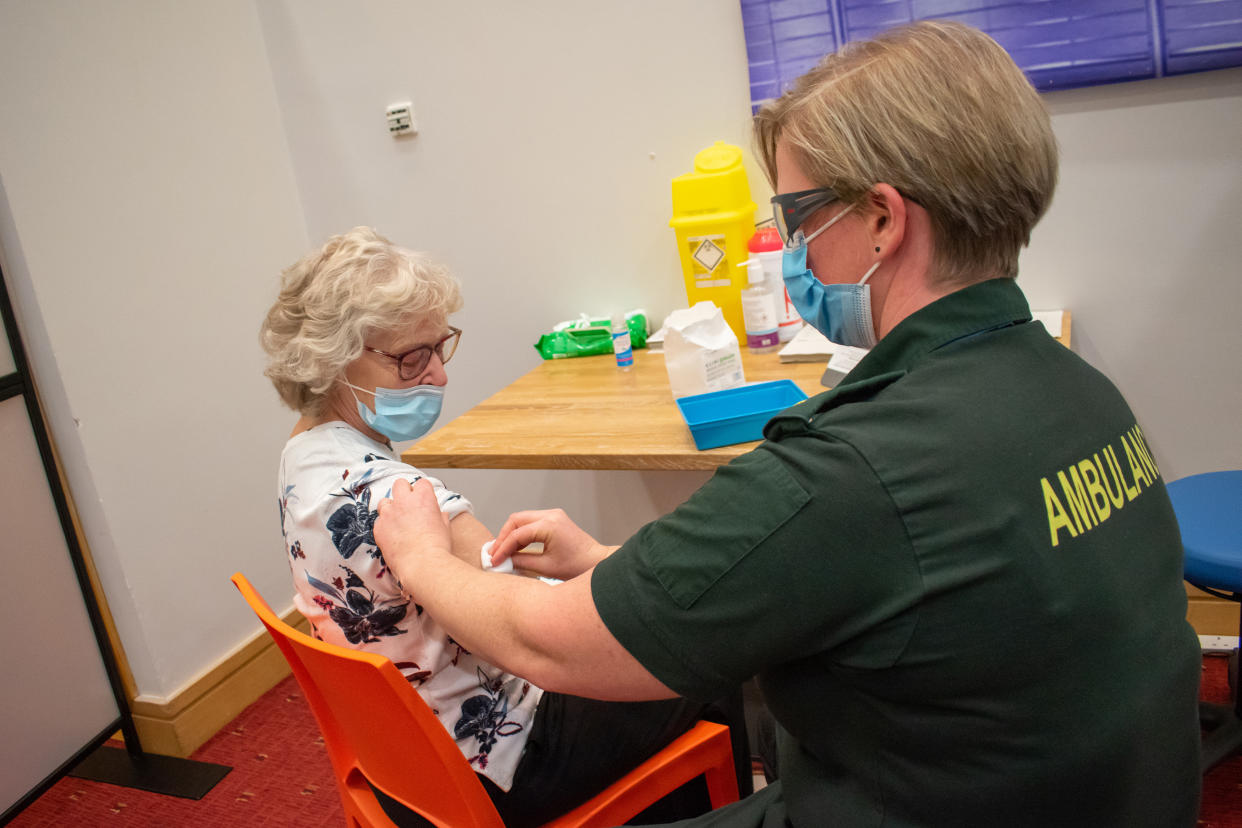  An elderly woman receives an injection of a Covid-19 vaccine at a NHS vaccination centre that has been set up at the Life Science Centre. Serval mass vaccination centres now opened to the general public as the government continues to ramp up the vaccination programme against Covid-19. (Photo by Nicolas Briquet / SOPA Images/Sipa USA) 