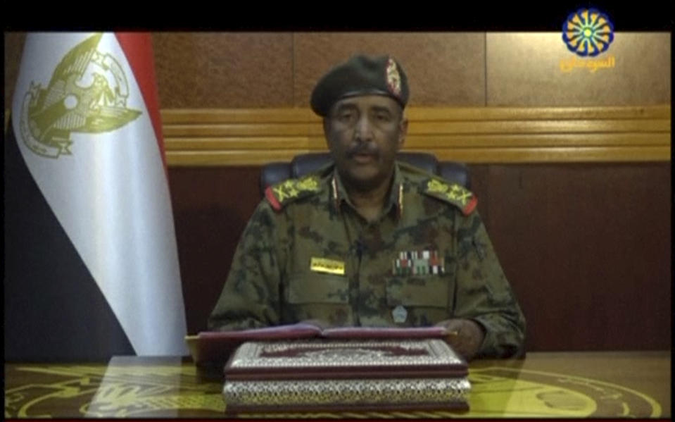 In this frame grab from video provided by Sudan TV, Lieutenant General Abdel-Fattah Burhan, head of the Sudanese Transitional Military Council, TMC, makes a broadcast announcement in Khartoum, Sudan, Tuesday, June 4, 2029. The TMC on Tuesday said that they want to stage early elections in the country and that all agreements with protest leaders have been cancelled. The statement came a day after a pro-democracy sit-in outside the army command base in the capital Khartoum was violently overrun by the ruling army. Protest organizers said 35 people died in the carnage Monday. (Sudan TV via AP)