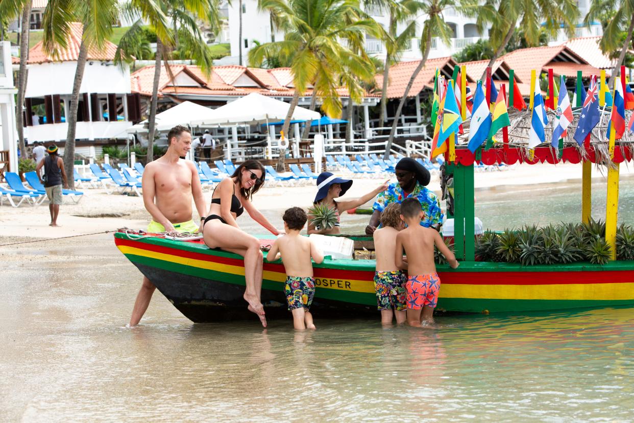 Family beach fun at Windjammer Landing Villa Beach Resort in St. Lucia.