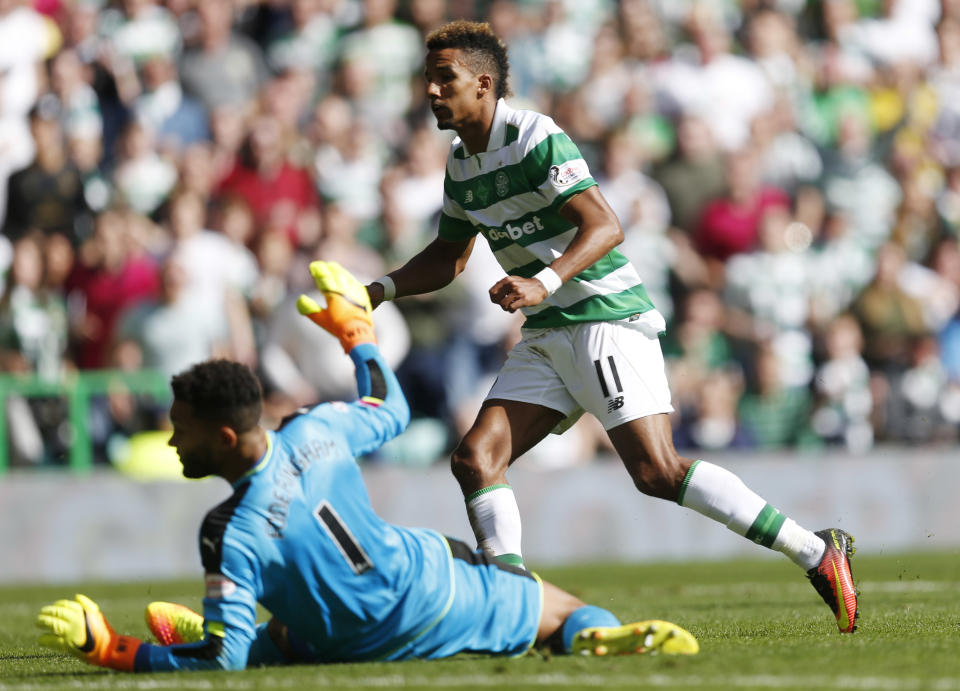 Britain Soccer Football - Celtic v Rangers - Scottish Premiership - Celtic Park - 10/9/16 Celtic&#39;s Scott Sinclair scores their third goal  Reuters / Russell Cheyne Livepic EDITORIAL USE ONLY. No use with unauthorized audio, video, data, fixture lists, club/league logos or &quot;live&quot; services. Online in-match use limited to 45 images, no video emulation. No use in betting, games or single club/league/player publications.  Please contact your account representative for further details.