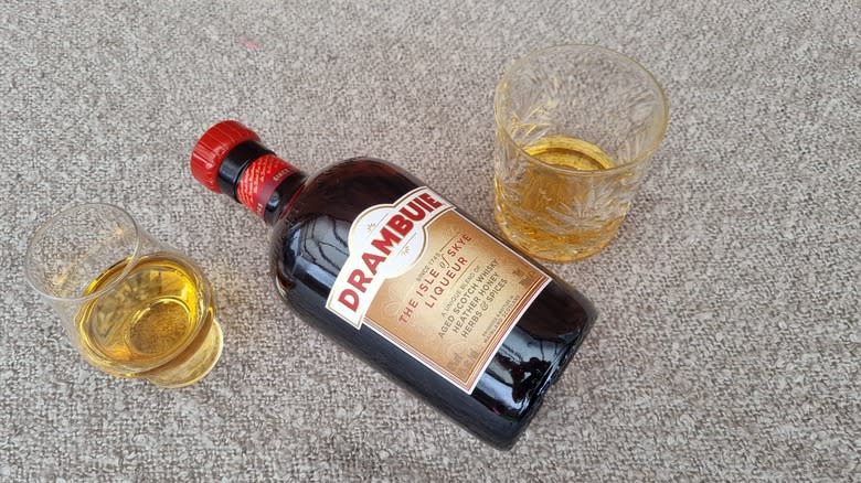 Bottle of Drambuie with glasses