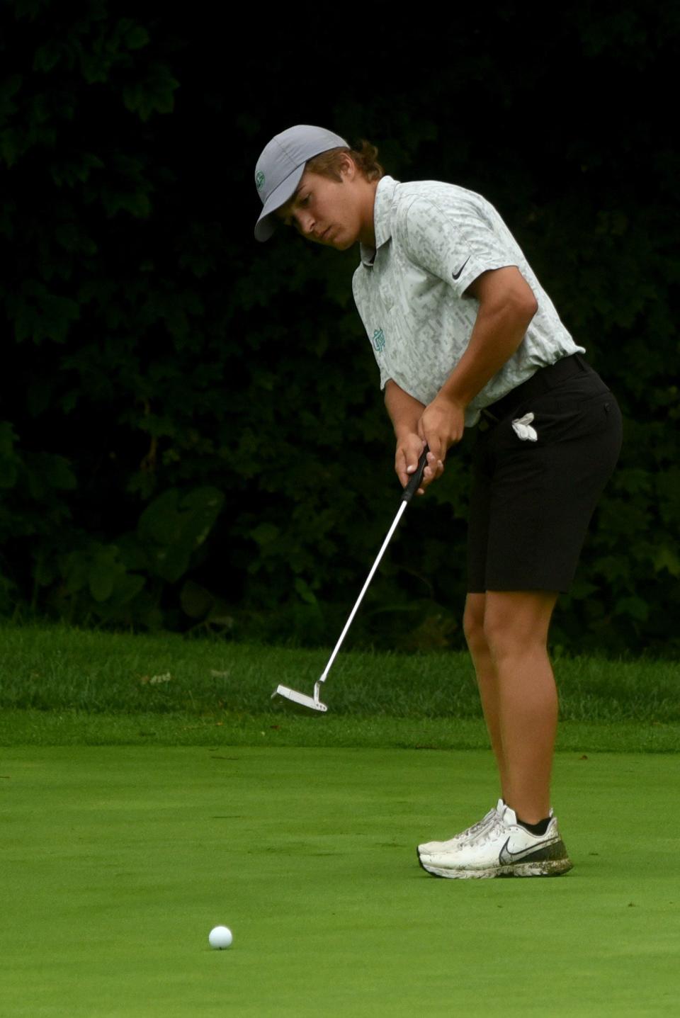 Newark Catholic's Brian Luft putts during the Licking County League's first tournament event of the season on Wednesday, Aug. 10, 2022 at Clover Valley Golf Club in Johnstown.