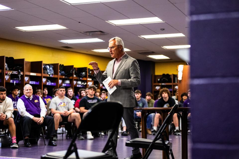 Former Ohio State coach Jim Tressel addresses the football team while appearing recently on the Ashland University campus.