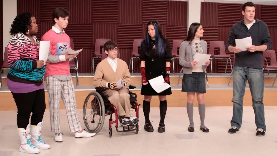 Amber Riley, Chris Colfer, Kevin McHale, Jenna Ushkowitz, Lea Michele and Cory Monteith in an episode of "Glee."  - FOX Image Collection/Getty Images