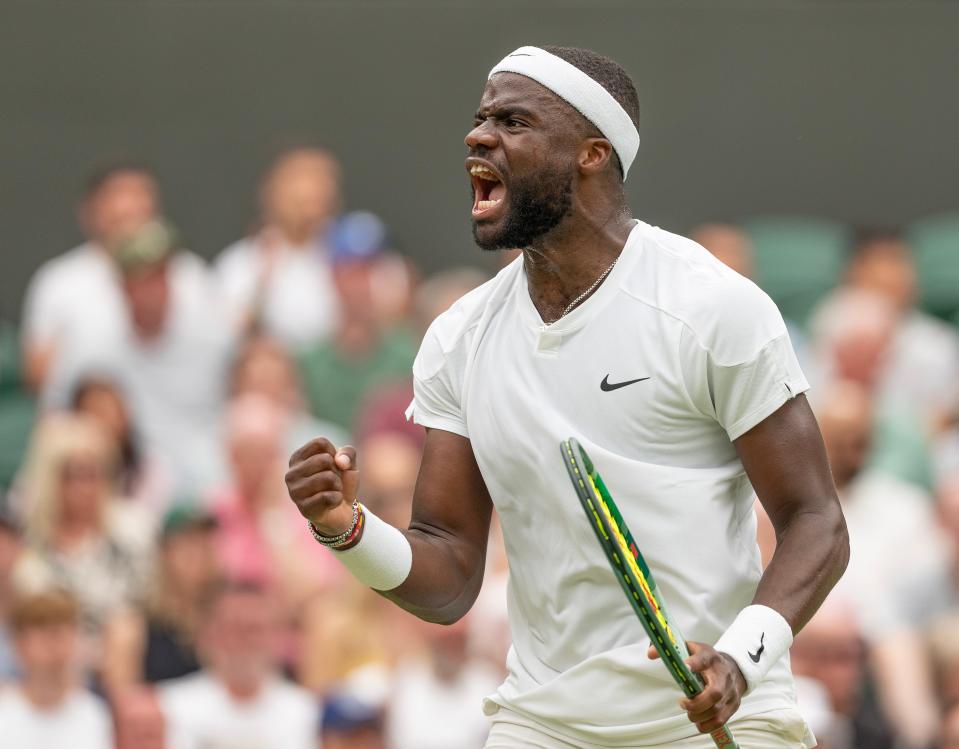 Frances Tiafoe celebrates a point against Carlos Alcaraz.