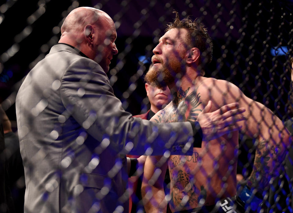 Conor McGregor talks to UFC president Dana White following his loss to Khabib Nurmagomedov at UFC 229 at T-Mobile Arena in Las Vegas. (Getty Images)