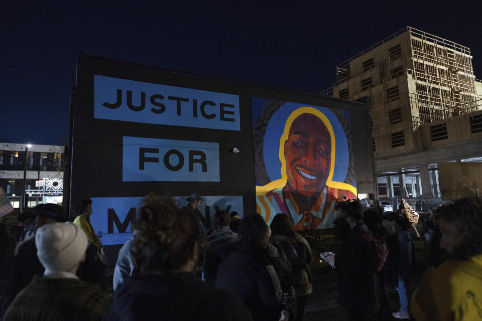 Protestors gather at a rally after the verdict was read at the trial of three Tacoma police officers in the killing of Manny Ellis, at Pierce County Superior Court, Thursday, Dec. 21, 2023, in Tacoma, Wash. (AP Photo/Maddy Grassy)