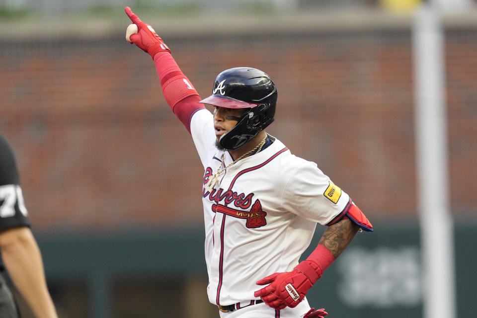 Atlanta Braves' Orlando Arcia gestures as he rounds the bases after hitting a solo home run in the first inning of a baseball game against the Boston Red Sox Wednesday, May 8, 2024, in Atlanta. (AP Photo/John Bazemore)