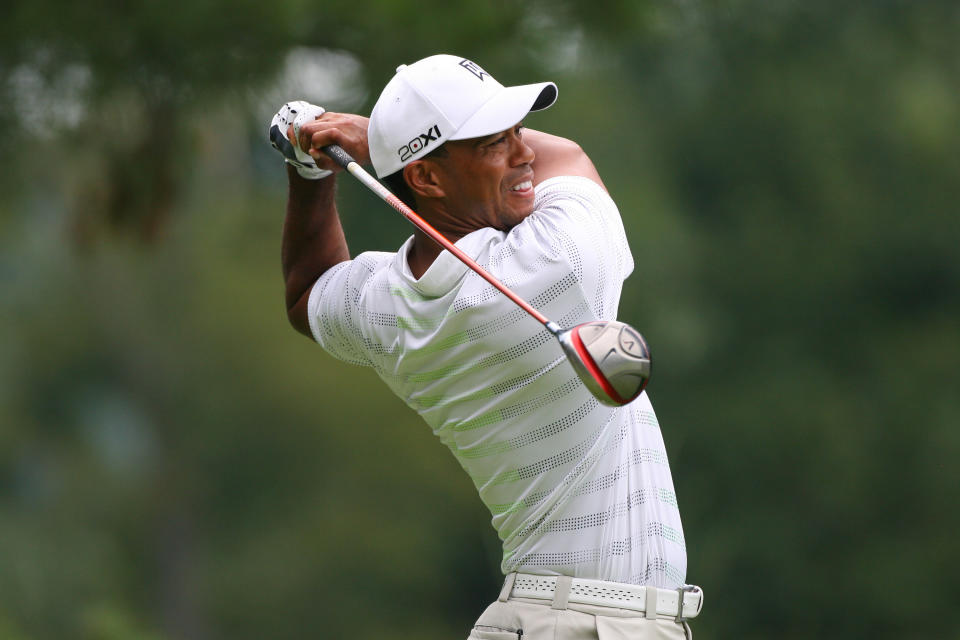 Tiger Woods hits his tee shot on the sixth hole during the first round of the Greenbrier Classic at the Old White TPC on July 5, 2012 in White Sulphur Springs, West Virginia. (Photo by Hunter Martin/Getty Images)