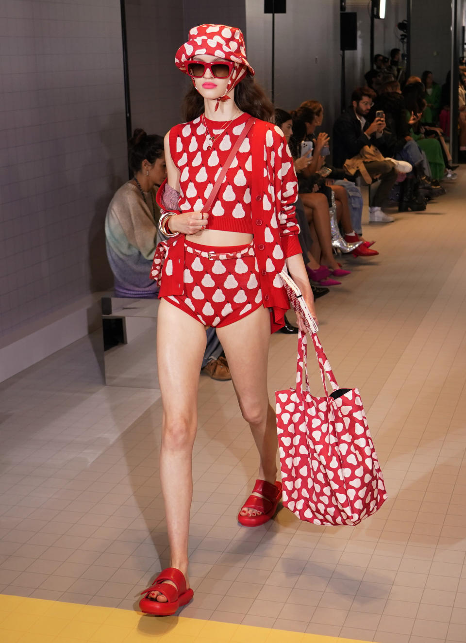 A model wears a creation as part of the Benetton women's Spring Summer 2023 collection presented in Milan, Italy, Sunday, Sept. 25, 2022. (AP Photo/Alberto Pezzali)