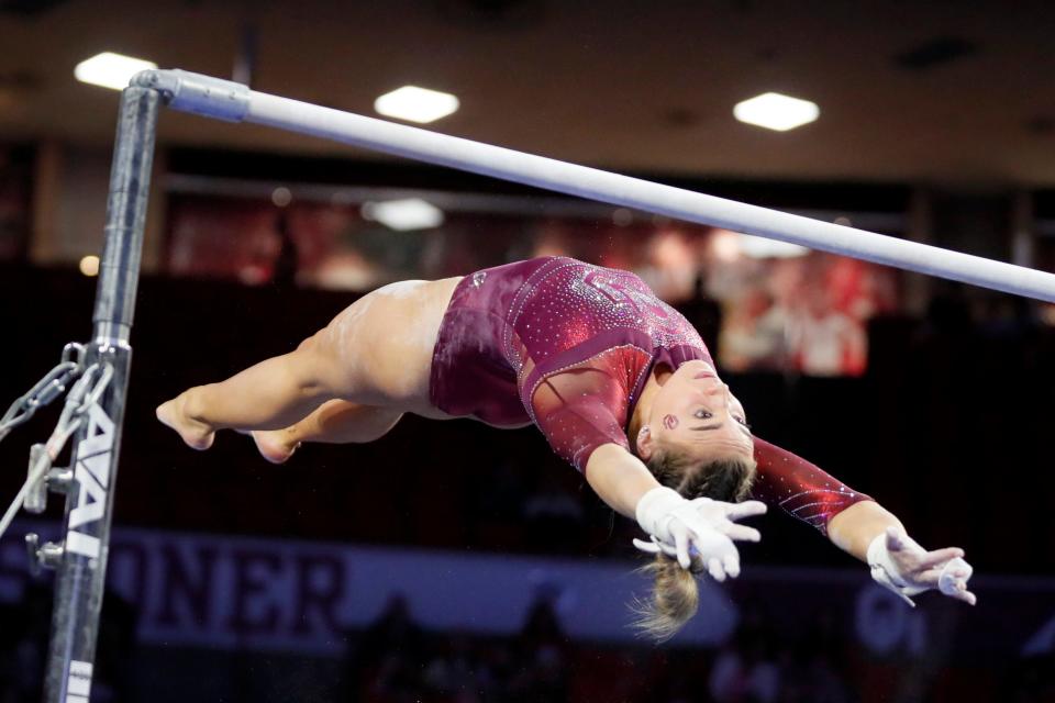 OU's Danielle Sievers competes on the bars Saturday in the NCAA women's gymnastics regionals at Lloyd Noble Center in Norman.