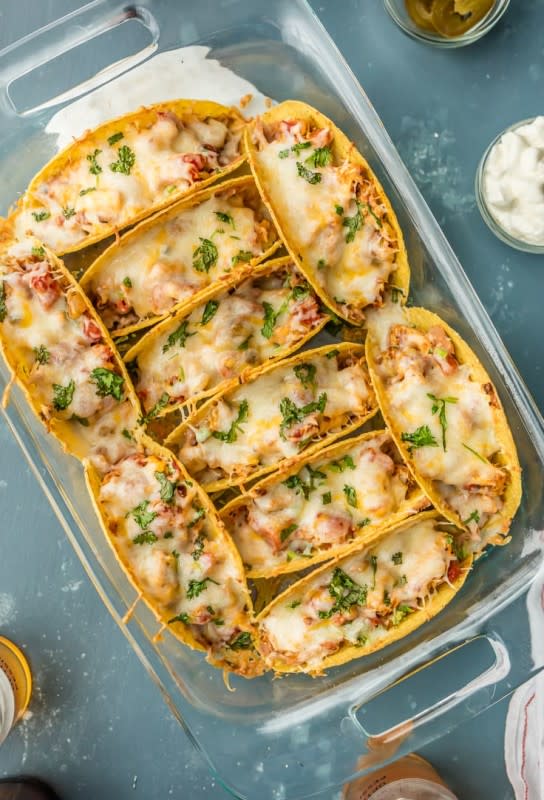 <p>The Cookie Rookie</p><p>These are so easy and delicious that it's no wonder they are an absolute internet sensation. Get this <a href="https://www.thecookierookie.com/baked-spicy-chicken-tacos/" rel="nofollow noopener" target="_blank" data-ylk="slk:Baked Chicken Tacos;elm:context_link;itc:0;sec:content-canvas" class="link rapid-noclick-resp">Baked Chicken Tacos</a> recipe!</p>