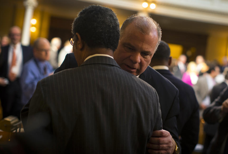 New Jersey state Senate President Stephen Sweeney&nbsp;grabs hold of&nbsp;a colleague on the floor of the legislative chamber in February 2015. (Photo: Mike Segar / Reuters)