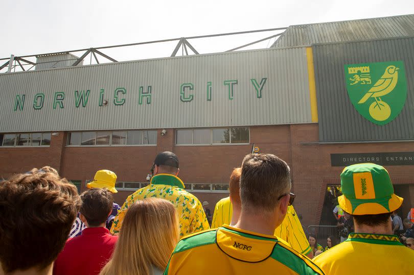 Norwich City supporters await the arrival of their team coach at Carrow Road on Sunday -Credit:MI News/NurPhoto via Getty Images