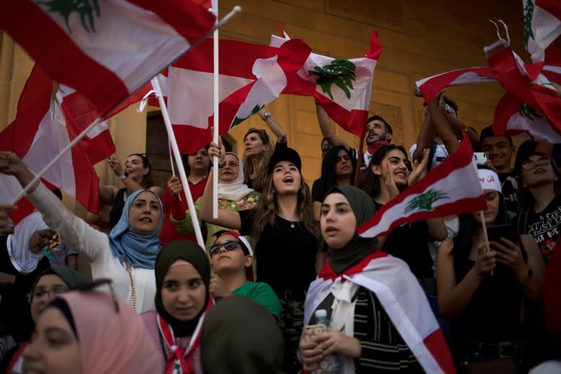 Demonstrators shout slogans during an anti-government protest in downtown Beirut