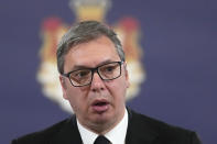 Serbian President Aleksandar Vucic addresses media after shooting in Ribnikar school in Belgrade, Serbia, Wednesday, May 3, 2023. Police say a 13-year-old who opened fire at his school drew sketches of classrooms and made a list of people he intended to target. He killed eight fellow students and a school guard before being arrested Wednesday. (AP Photo/Darko Vojinovic)