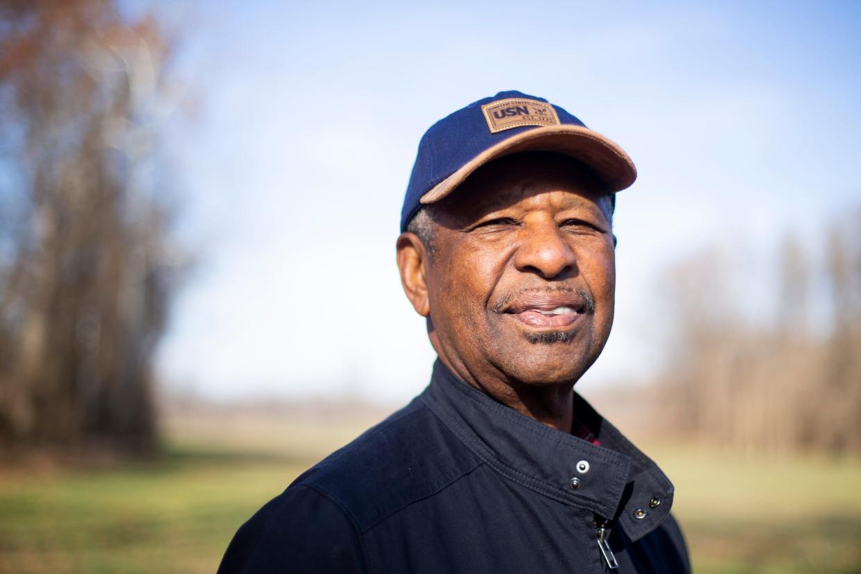 L.V. Jackson, a retired farmer, poses for a portrait on a part of his brother-in-law James Melvin Johnson Sr.’s 40 acres of farmland in Jackson, Tenn., on Wednesday, Dec. 6, 2023. The land is currently empty but in season Johnson will grow soybeans. The men are applying for a piece of a $2.2 billion USDA Discrimination Financial Assistance Program, which aims to provide financial assistance to farmers, ranchers and forest landowners who experienced discrimination in USDA farm lending programs prior to 2021.