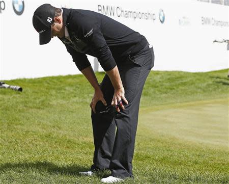 Zach Johnson of the U.S. pauses after finishing his final round of the BMW Championship golf tournament at the Conway Farms Golf Club in Lake Forest, Illinois, September 16, 2013. REUTERS/Jim Young