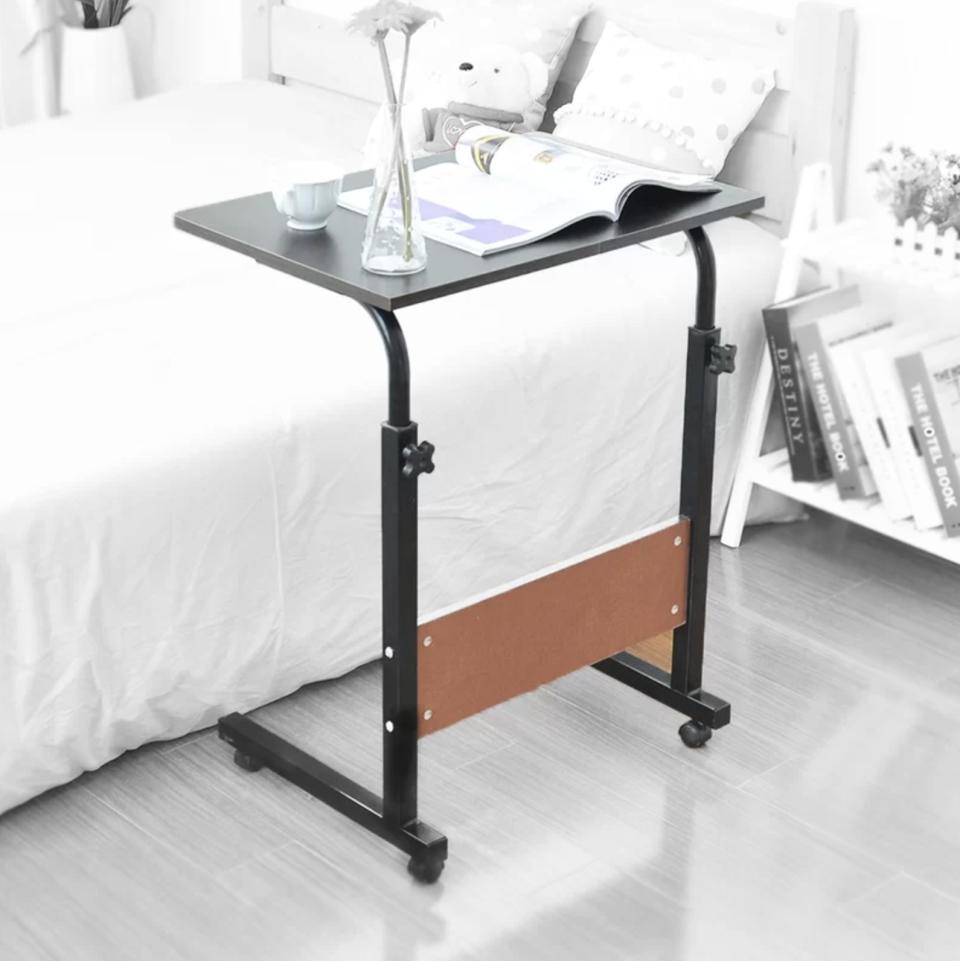 The laptop stand in a bedroom