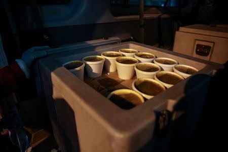 A batch of soup for the homeless is seen as New York City's Coalition for the Homeless delivers food, donated clothing and supplies to homeless people as part of their weekly distribution during winter storm Grayson in Manhattan, New York City, U.S., January 4, 2018. REUTERS/Amr Alfiky