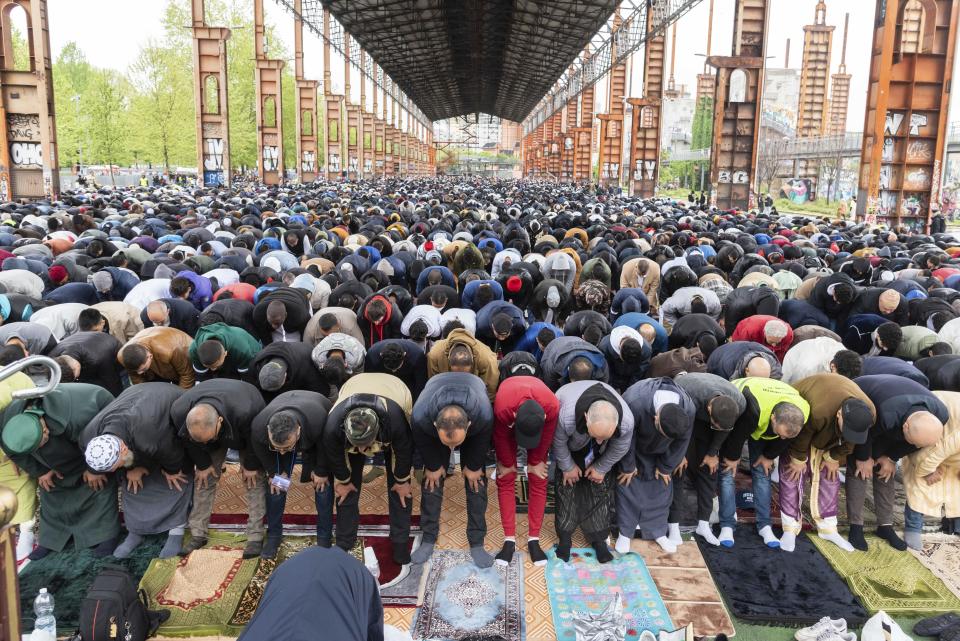 Faithful attend the final prayer of Eid al-Fitr, marking the end of Ramadan, at the Dora Park in Turin, Italy, Friday, April 21, 2023. (Matteo Secci/LaPresse via AP)