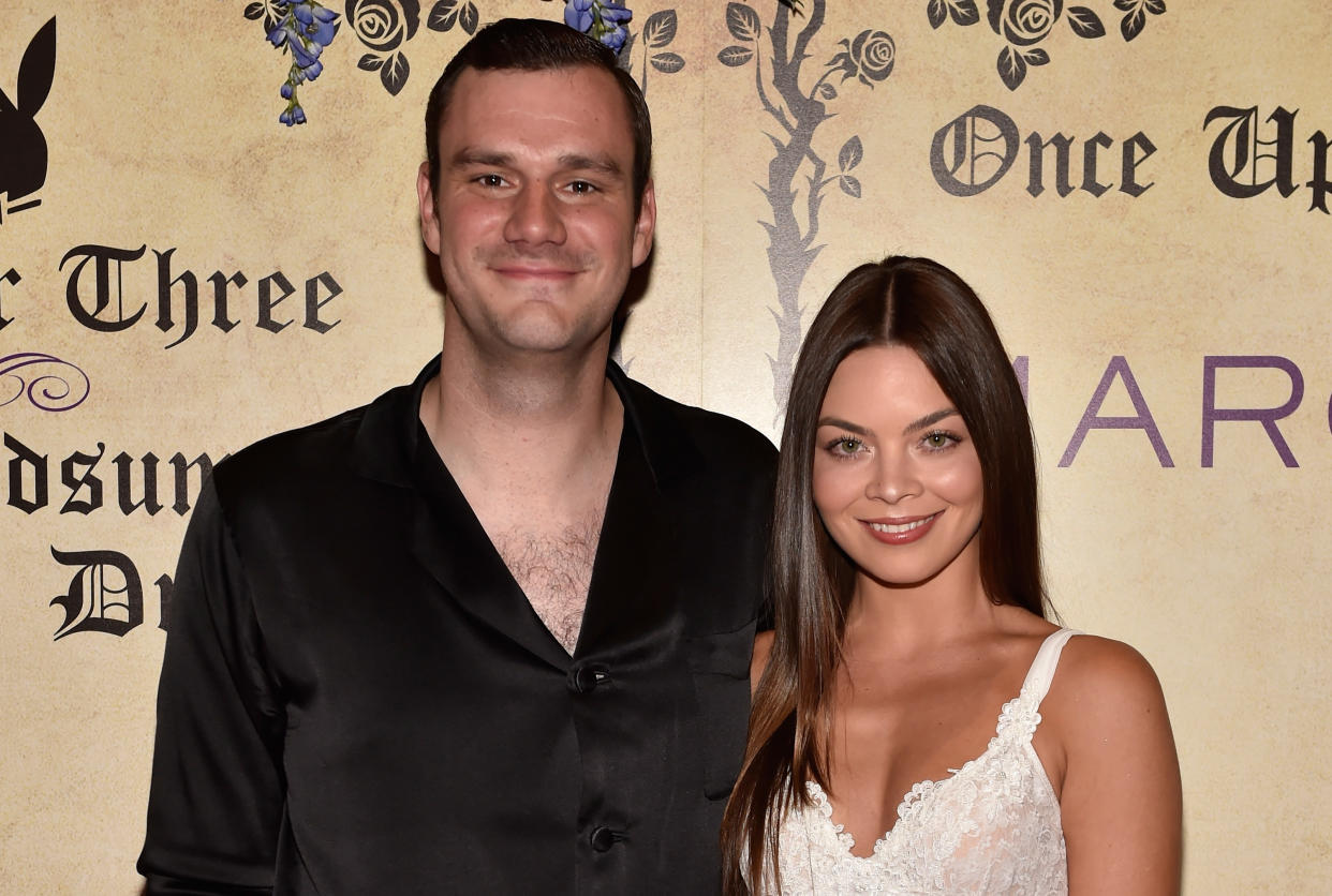 LAS VEGAS, NV - JULY 28:  Chief Creative Officer of Playboy Cooper Hefner (L) and his fiance Scarlett Byrne arrive at Playboy's Midsummer Night's Dream at the Marquee Nightclub at The Cosmopolitan of Las Vegas on July 28, 2018 in Las Vegas, Nevada.  (Photo by David Becker/Getty Images for Playboy)