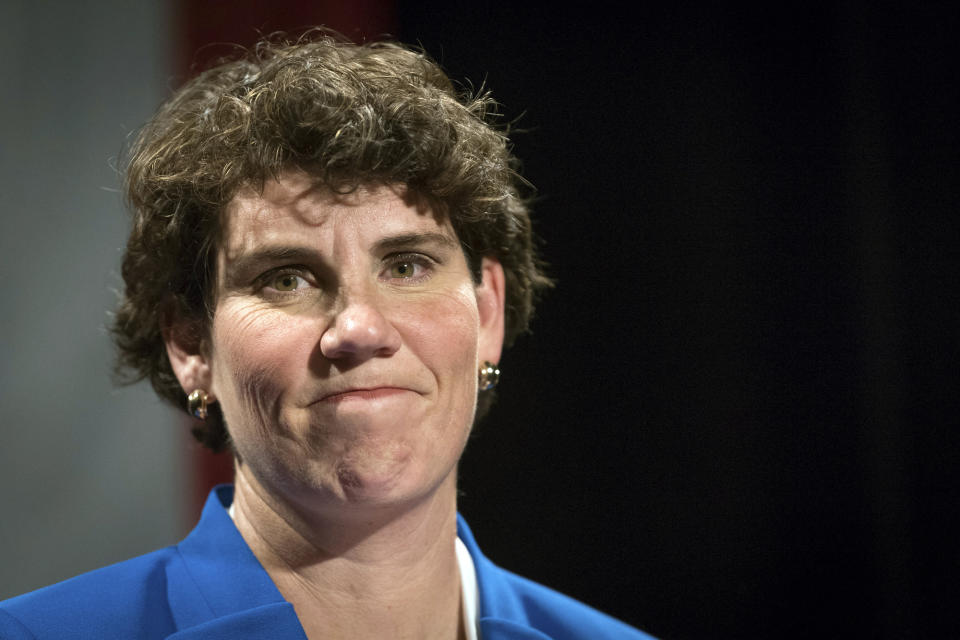 FILE - In this Nov. 6, 2018, file photo, Amy McGrath speaks to supporters in Richmond, Ky. Looking to flex his newfound influence after his Senate campaign fell just short, Charles Booker reached out Thursday, July 2, 2020 to help unite Kentucky Democrats behind McGrath's uphill fight to unseat Republican Senate Majority Leader Mitch McConnell.(AP Photo/Bryan Woolston, File)