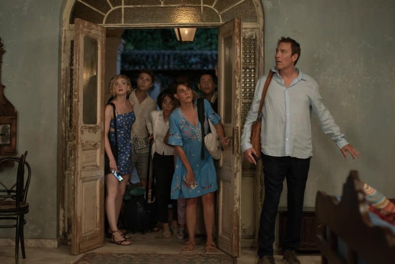 From left, Elena Kampouris, Elias Kacavas, Andrea Martin, Nia Vardalos, Louis Mandylor and John Corbett arrive in Greece. Photo courtesy of Focus Features