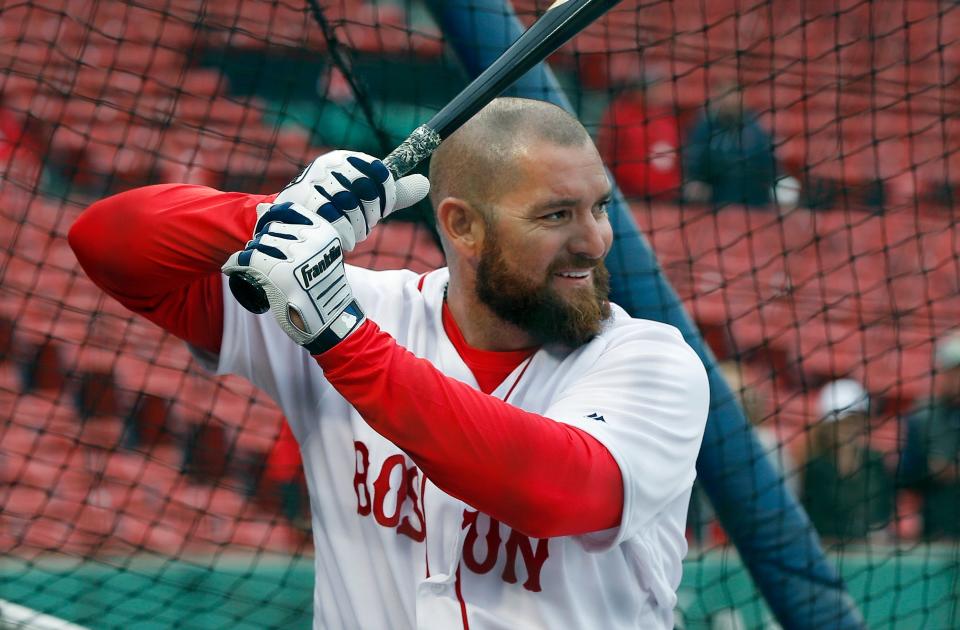 Former Boston Red Sox player Jonny Gomes warms up before a Red Sox alumni game on May 27, 2018 in Boston. Gomes has participated in Banana Ball games in Savannah and Kansas City this year.