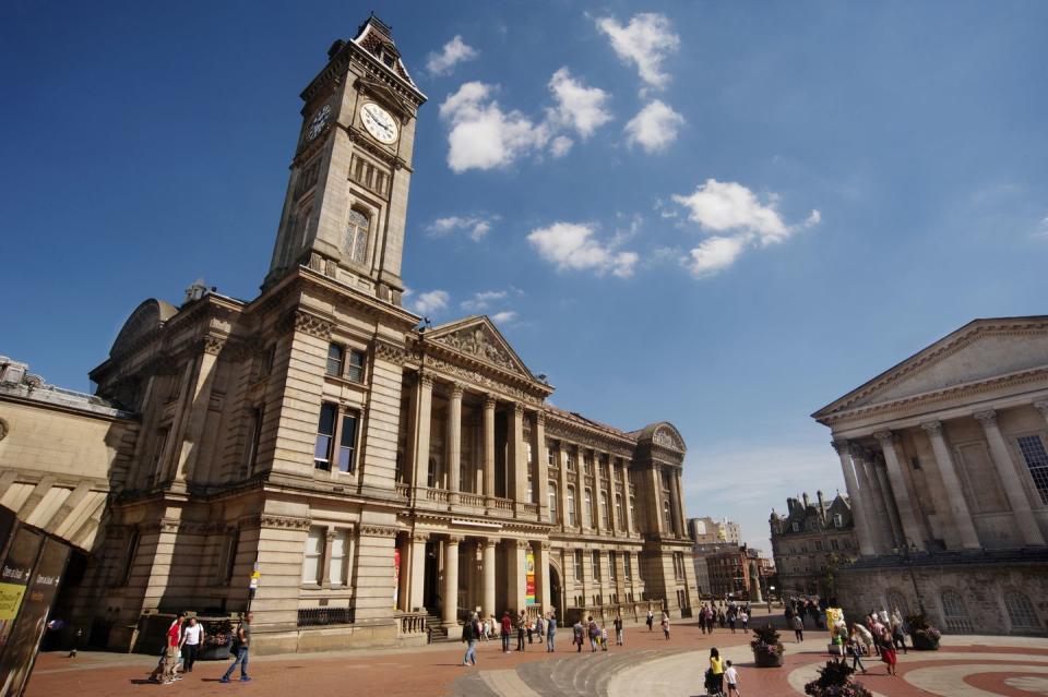 a wide angle view of the grade i listed birmingham museum art gallery, a victorian baroque building and clock tower, built by yeoville thomason in 1834