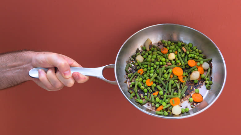 Overcooked vegetables in a pan