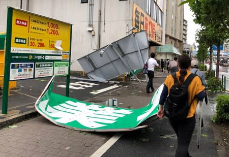 Collapsed steel advertising boards caused by Typhoon Faxai are seen at Edgawa ward in Tokyo, Japan