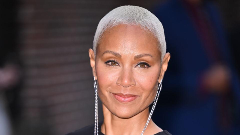 Jada Pinkett Smith wearing an interesting earrings-necklace hybrid piece 