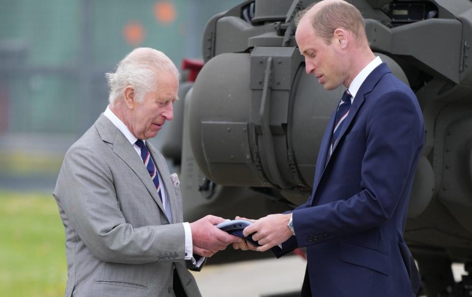 The King hands over the role of Colonel-in-Chief of the Army Air Corps to Prince William