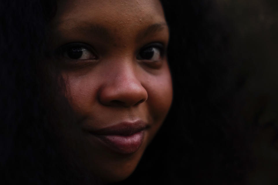 Mira Ugwuadu, 17, poses for a portrait on Thursday, Nov. 17, 2022, in Marietta, Ga. School districts across the country have struggled to staff up to address students' mental health needs. (AP Photo/Brynn Anderson)