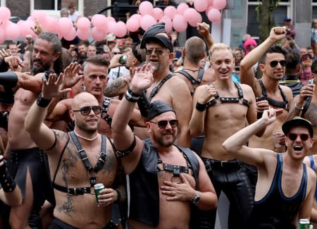 Participants attend the annual gay pride parade in Amsterdam
