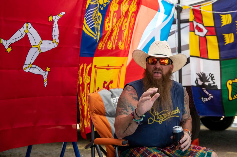 Brian Decker of Huntington Beach talks about his tips for newcomers while sitting in his camp enjoying his 14th trip to the festival in The Resort camping area at Stagecoach at the Empire Polo Club in Indio, Calif., Saturday, April 29, 2023. 