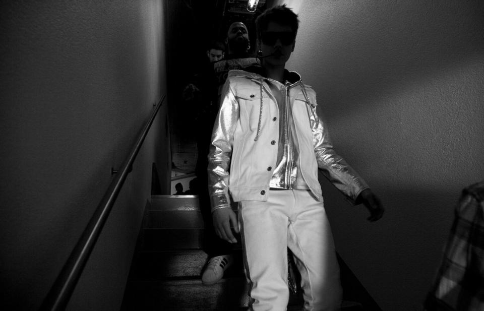 Bieber dressed for the show, makes his way to the stage. April 8, 2011 <b>More on Time.com:</b> <a href="http://www.time.com/time/photogallery/0,29307,1993637,00.html" rel="nofollow noopener" target="_blank" data-ylk="slk:Photos: A Brief History of Pixar;elm:context_link;itc:0;sec:content-canvas" class="link ">Photos: A Brief History of Pixar</a>