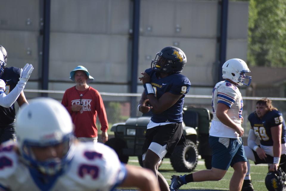 Mooresville's Nick Patterson releases a pass during the Pioneers' scrimmage with Indian Creek on June 15, 2022.