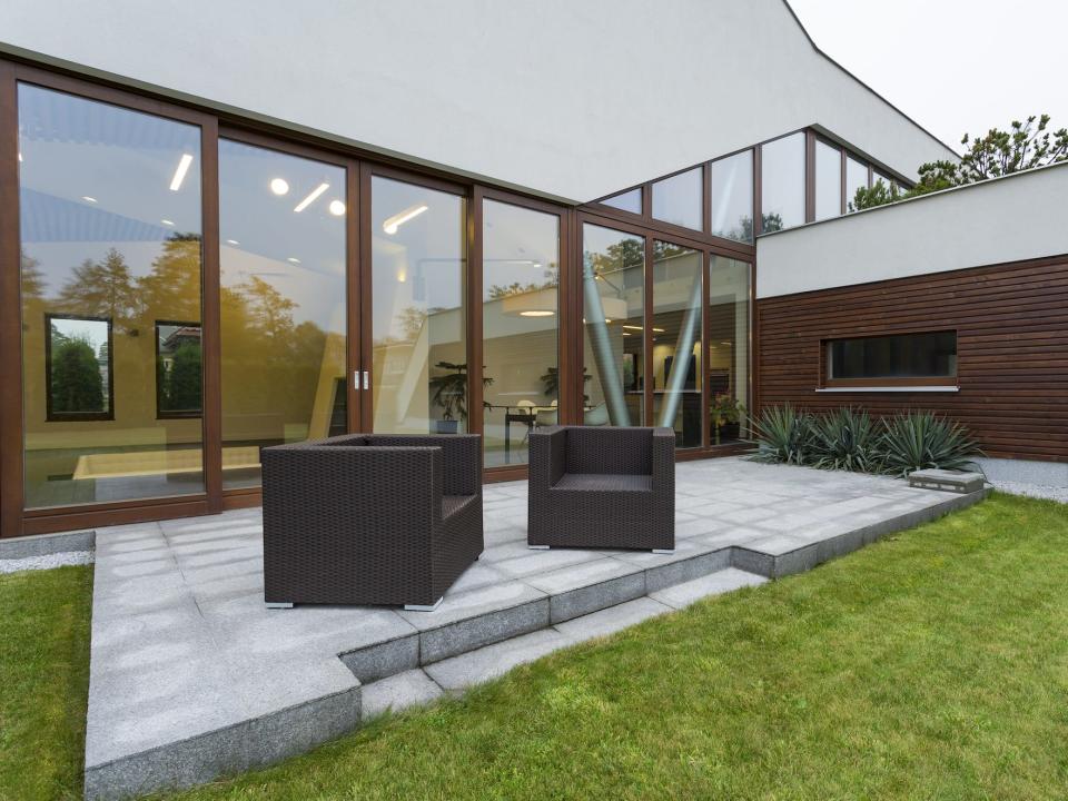 industrial, minimalist patio and backyard of a fancy house