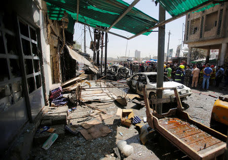 Damaged shops are seen at the site of car bomb attack near a government office in Karkh district in Baghdad, Iraq May 30, 2017. REUTERS/Khalid al-Mousily