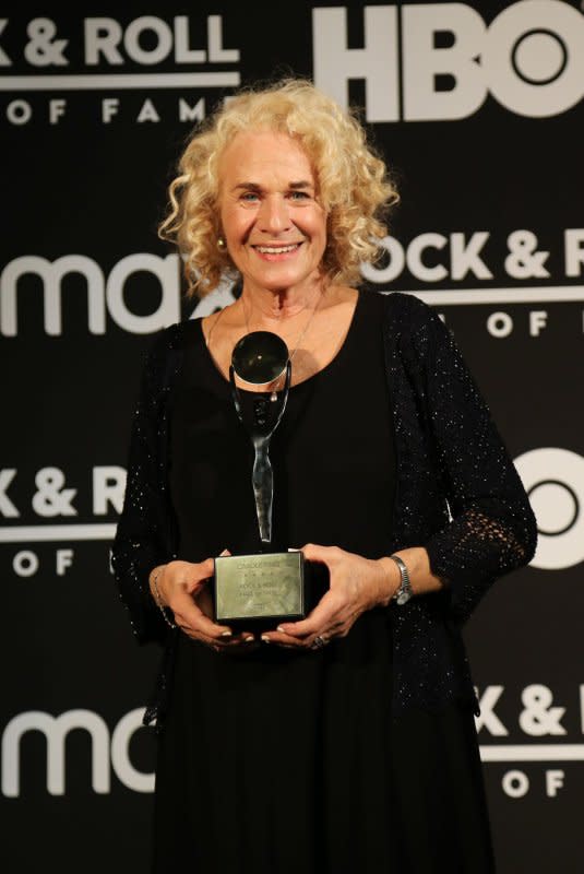 2021 Rock and Roll Hall of Fame inductee, Carole King, poses with her trophy at the Rocket Mortgage Field House during the Rock and Roll Hall of Fame induction ceremony in Cleveland on October 30. The singer turns 82 on February 9. File Photo by Aaron Josefczyk/UPI