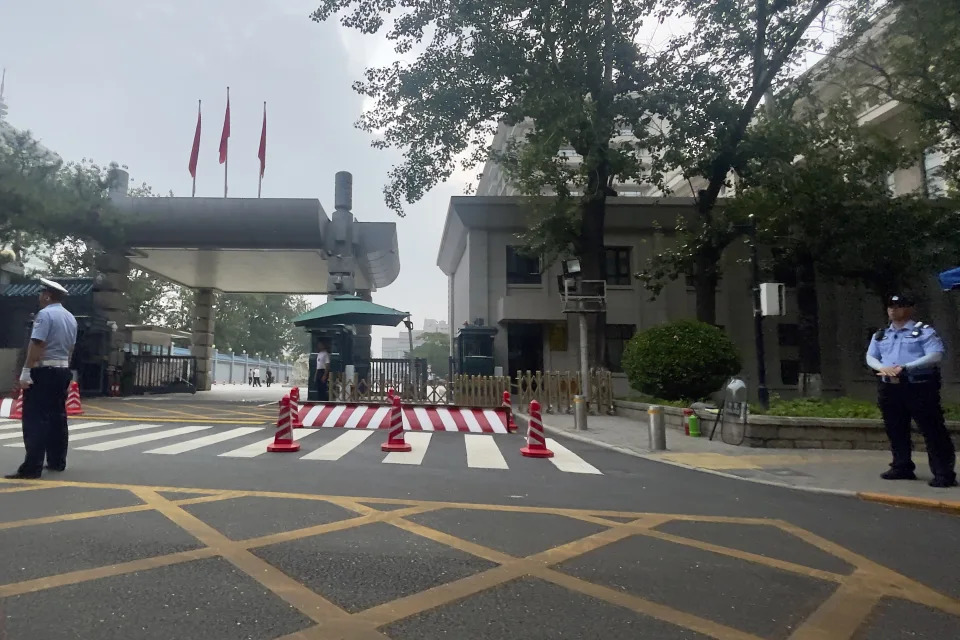 Chinese security personnel guard the entrance to the Jingxi Hotel where the Communist Party's 205-member Central Committee is holding its third plenum in Beijing, Monday, July 15, 2024. China's ruling Communist Party is starting a four-day meeting Monday, July 15, 2024 that is expected to lay out a strategy for self-sufficient economic growth in an era of heightened national security concerns and restrictions on access to American technology. (AP Photo/Andy Wong)