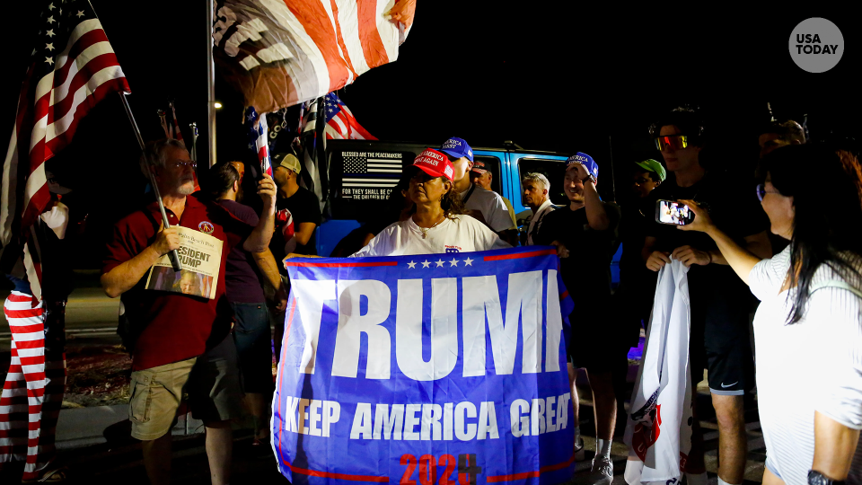 Supporters of former President Donald Trump rally near his home at Mar-A-Lago in Palm Beach, Fla., on Aug. 8.