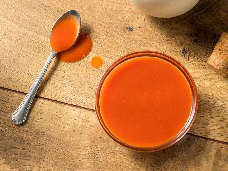 buffalo sauce and spoon