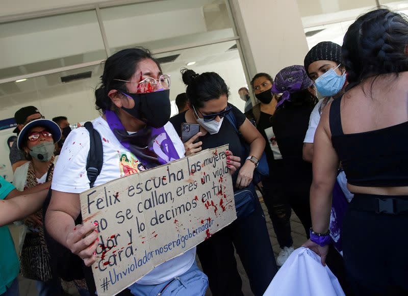 FILE PHOTO: Injured protester is seen near an event attended by Mexico's President Obrador and Argentina's President Fernandez in Iguala