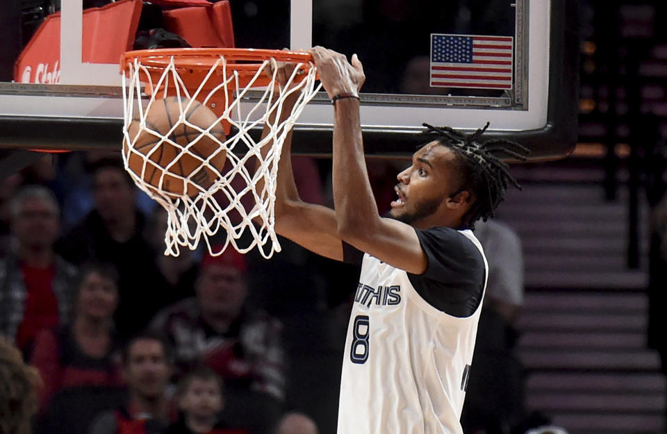 Memphis Grizzlies forward Ziaire Williams dunks during the first half of an NBA basketball game against the Memphis Grizzlies in Portland, Ore., Friday, Nov. 3, 2023. (AP Photo/Steve Dykes)