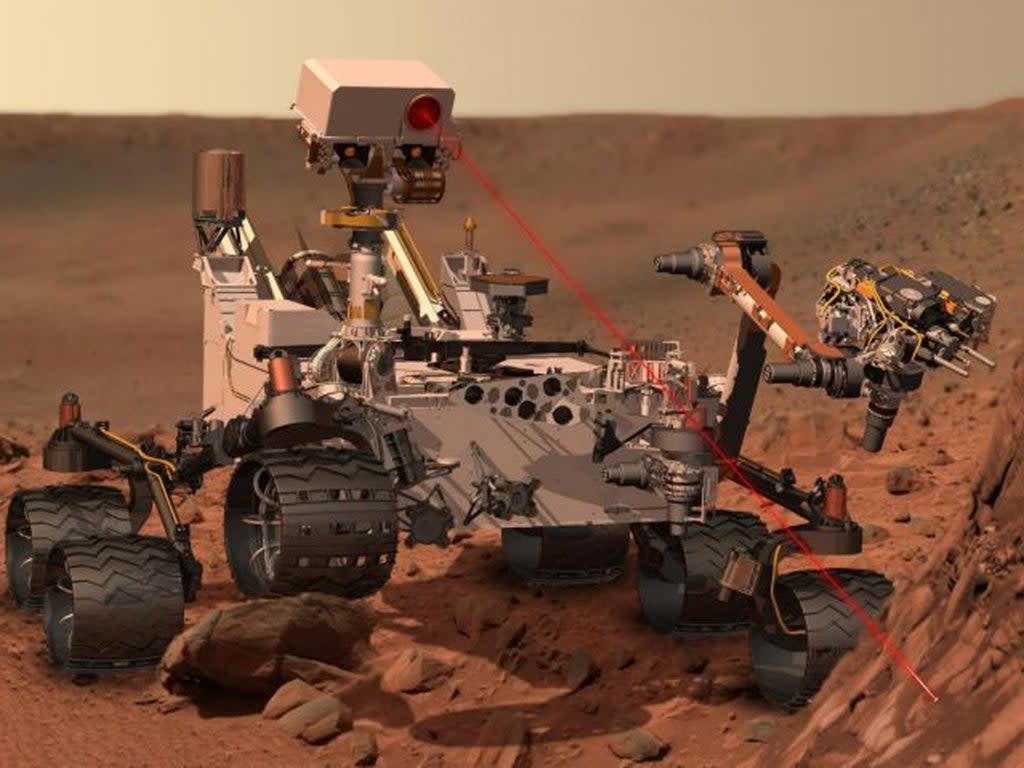 This artists rendering provided by NASA shows the Mars Rover, Curiosity. After traveling 8 1/2 months and 352 million miles, Curiosity will attempt a landing on Mars. (AP)