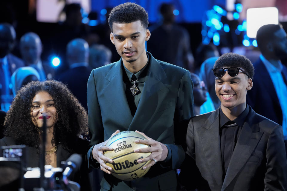 Victor Wembanyama reacts during introductions before the NBA basketball draft, Thursday, June 22, 2023, in New York. (AP Photo/John Minchillo)